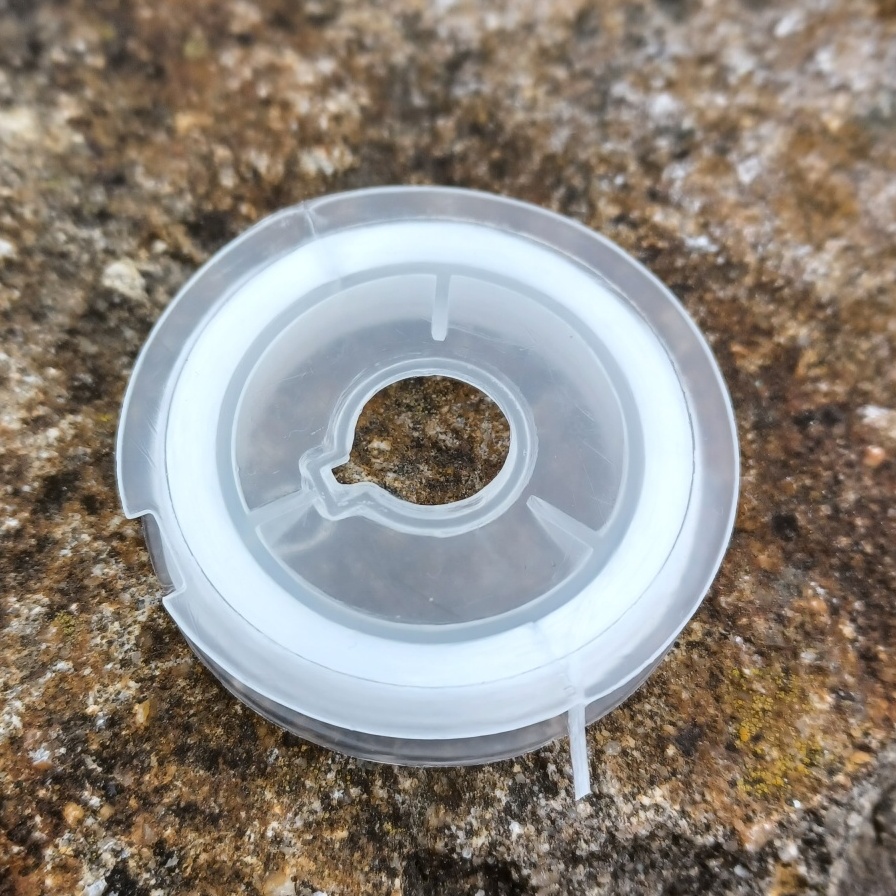 Pruženka plochá bílá 0,6mm